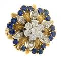 An 18 Karat Yellow Gold Diamond and Sapphire Ring