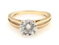 A 14 Karat Yellow Gold and Diamond Solitaire Ring