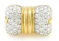 An 18 Karat Yellow Platinum and Diamond Ring Chaavae
