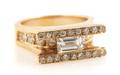 A 14 Karat Yellow Gold and Diamond Ring