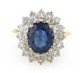 An 18 Karat Yellow Gold Sapphire and Diamond Ring