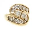 A 14 Karat Yellow Gold and Diamond Ring