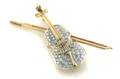 A 14 Karat Yellow Gold and Diamond Violin Pin