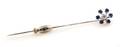 A 14 Karat White Gold Diamond and Sapphire Stick Pin