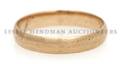 An 18 Karat Yellow Gold Band
