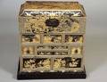 BLACK AND GOLD CHINOISERIE TABLE TOP CABINET