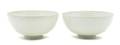 A Pair of Chinese Near White Glazed Bowls