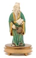 A Chinese Biscuit Green and Yellow Glazed Figure