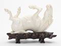 A Chinese Carved Ivory Figure of a Horse