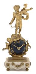 A French Bronze and Marble Figural Desk Clock