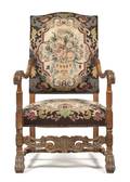 A Henry II Carved Walnut Open Armchair
