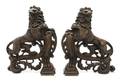 A Pair of Bronze Andirons