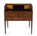 A Louis XVI Style Roll Top Mahogany Desk