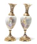 A Pair of Continental Porcelain and Champleve Mounted Urns