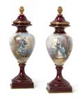A Pair of Continental Porcelain Urns