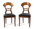 A Pair of Biedermeier Birch and Ebonized Side Chairs