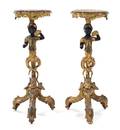 A Pair of Painted and Parcel Gilt Figural Pedestals