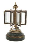 A Russian Silver Gilt and Enameled Revolving Photo Carousel