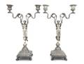 A Pair of French Silver TwoLight Figural Candelabra