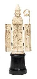 A Continental Carved Ivory Figure of a Bishop