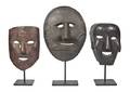 A Group of Three Carved Wood Masks Nepal