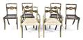 A Set of Six Regency Ebonized and Parcel Gilt Chairs