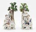 A Pair of Continental Porcelain Bocage Figural Groups