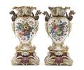 A Pair of Paris Porcelain Urns on Stands