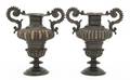 A Pair of Bronze Urns