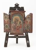 A Russian Painted Wood Triptych
