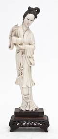 A Chinese Carved Ivory Figure of a Lady