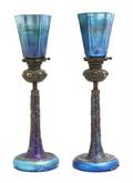 A Pair of Iridescent Glass and Bronze Electrified Candlesticks