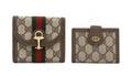 A Pair of Gucci Wallets