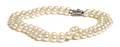 A Pair of Single Strand Cultured Pearl Necklaces with Platinum and Diamond Clasps