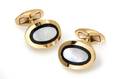 A Pair of 18 Karat Yellow Gold Onyx and MotherofPearl Cufflinks Bermann