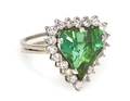 An 18 Karat White Gold Bluish Green Tourmaline and Diamond Ring