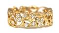 An 18 Karat Yellow Gold and Diamond Eternity Band