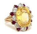 An 18 Karat Yellow Gold Platinum Natural Yellow Sapphire Ruby and Diamond Ring Oscar Heyman Brothers