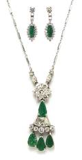 A Set of 14 Karat White Gold Diamond and Emerald Jewelry