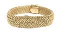 A 14 Karat Yellow Gold Surprise Wristwatch Cartier