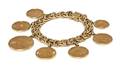 A 14 Karat Yellow Gold Charm Bracelet with US Gold Coins