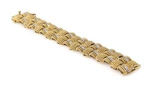 A 14 Karat Yellow Gold and Diamond Textured Link Bracelet