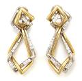 A Pair of 18 Karat Two Tone Gold and Diamond Earclips