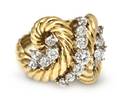 An 18 Karat Yellow Gold and Diamond Cluster Ring