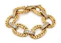 An 18 Karat Yellow Gold and Diamond Link Bracelet