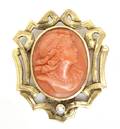 A 14 Karat Yellow Gold Diamond and Coral Cameo Brooch