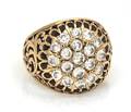 A 14 Karat Yellow Gold and Diamond Pave Ring