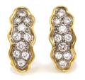 A Pair of 18 Karat Two Tone Gold and Diamond Earclips