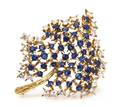 An 18 Karat Yellow Gold Sapphire and Diamond Leaf Brooch
