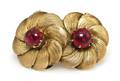 A Pair of 14 Karat Yellow Gold and Ruby Earclips
